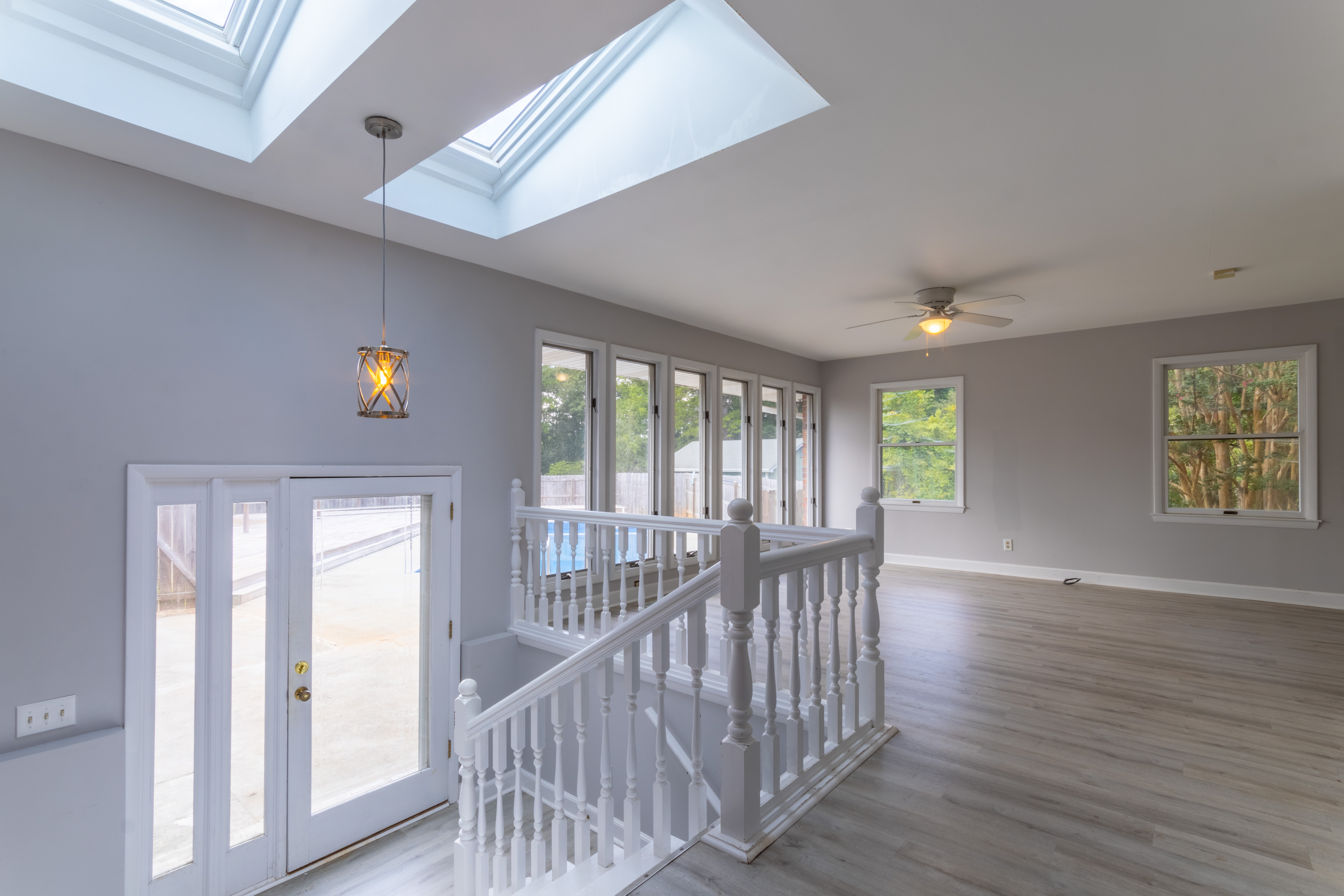 split level shot with large bay window